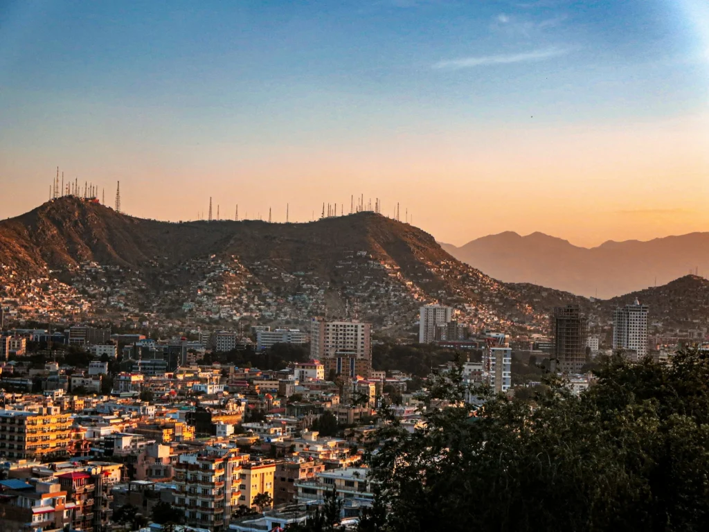 a view of a Kabul with mountains in the background. Photographer: Mohammad Husaini